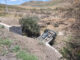 Conductora sale del camino y cae en arroyo seco de las Curvas del Perico