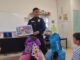 Agente DARE crea herramienta didáctica para niños en el uso correcto del 911